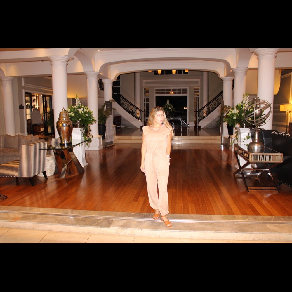 Nude jumpsuit in small